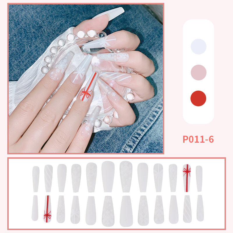 Fake Nails: Add a festive touch to your nails with these red short square press-on nails.