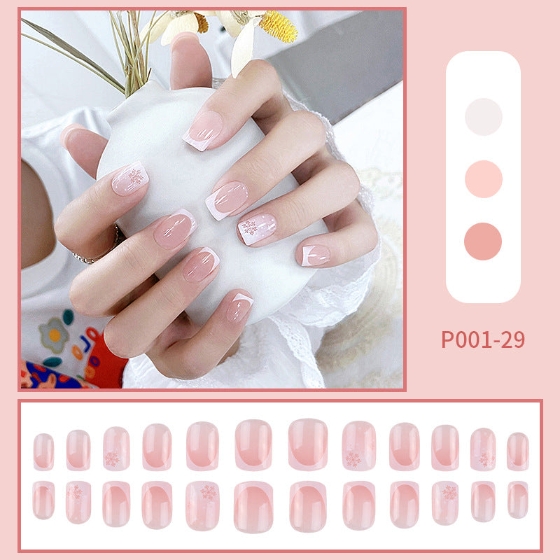 Fake Nails: Add a festive touch to your nails with these red short square press-on nails.