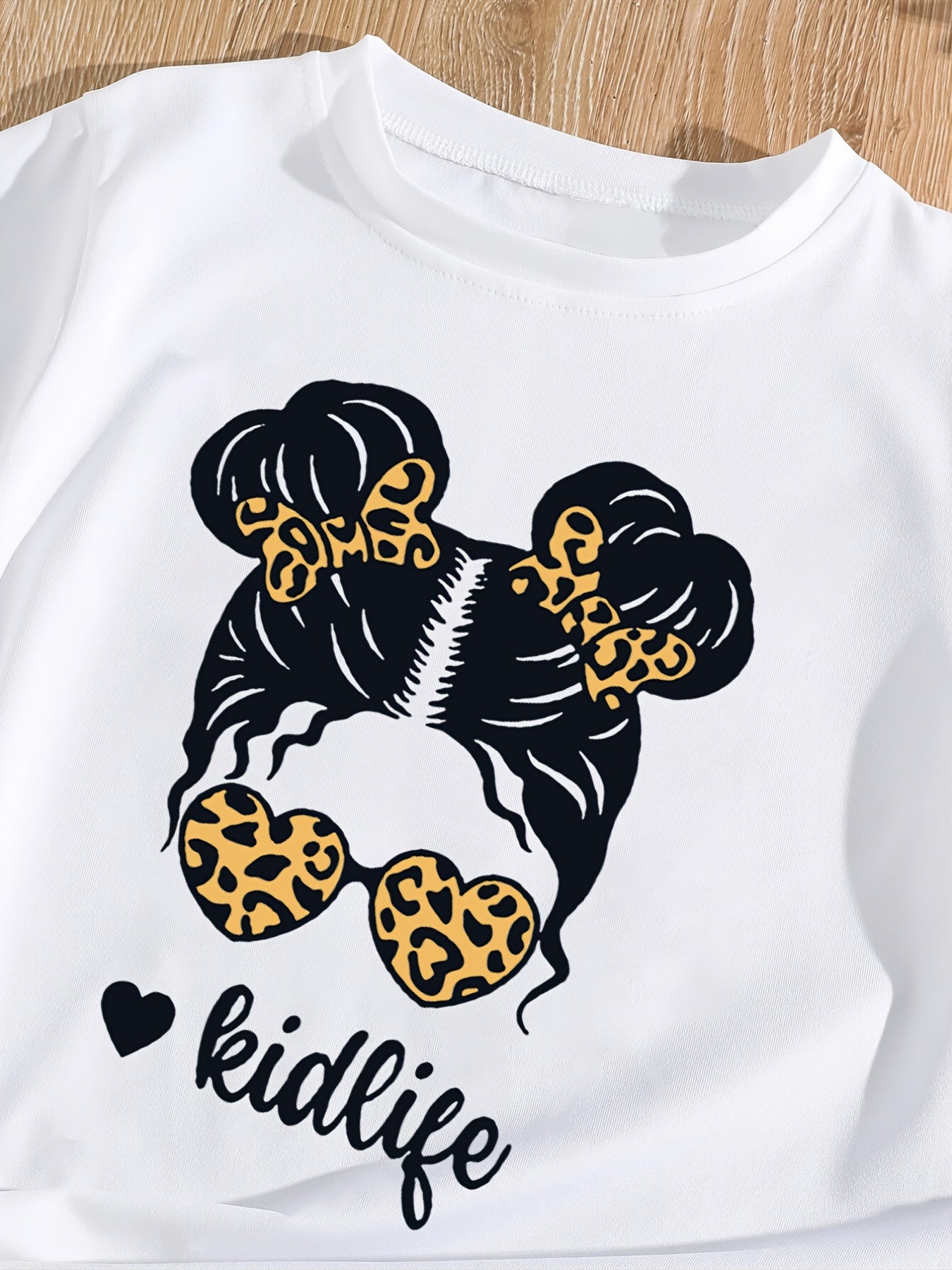 Cute Graphic Tee Top for Girls - A Fun and Comfortable Summer Outfit